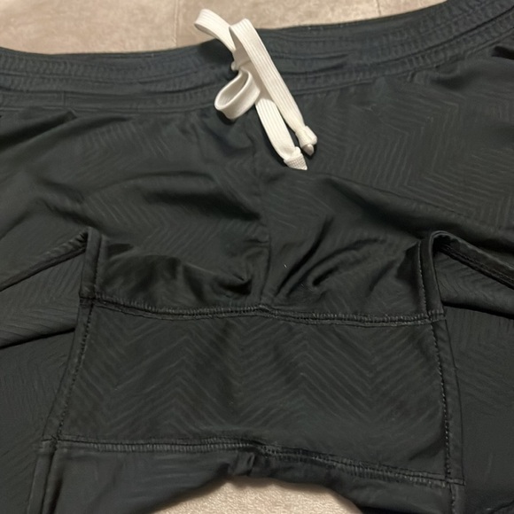 Nike dry fit shorts in black and gold. Live strong logo. - Picture 10 of 10